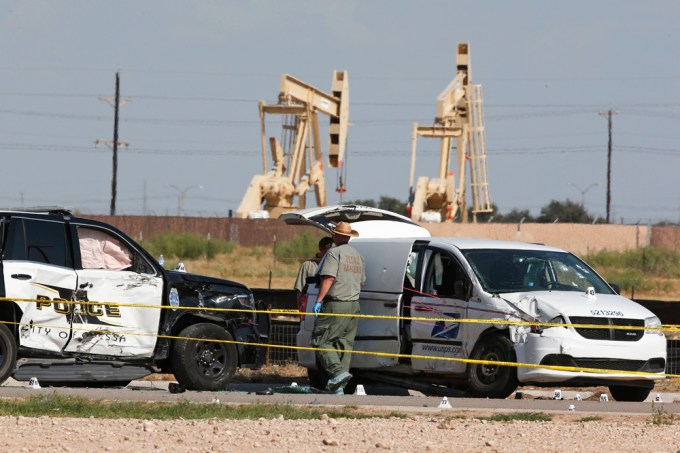 The stolen mail van is pictured after a mass shooting in Odessa, TX
