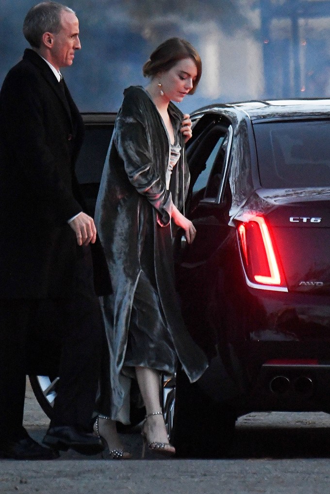 Emma Stone exits a car for Jennifer Lawrence & Cooke Maroney’s wedding