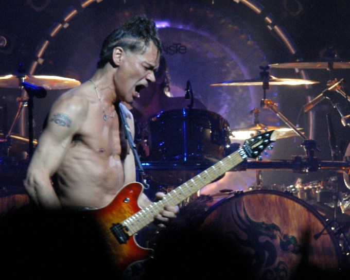 Eddie Van Halen Rocks On With No Shirt