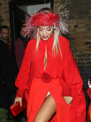 Rita Ora's Wardrobe Malfunction: Shows Spanx Under High Slit Red