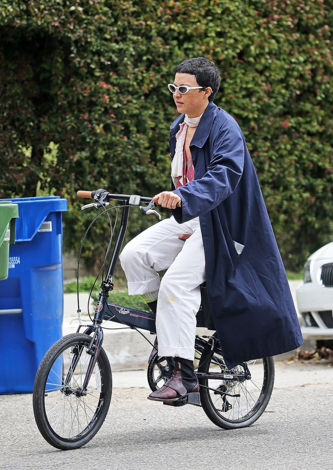 *EXCLUSIVE* Alia Shawkat leaves Brad Pitt’s gated community on her bicycle