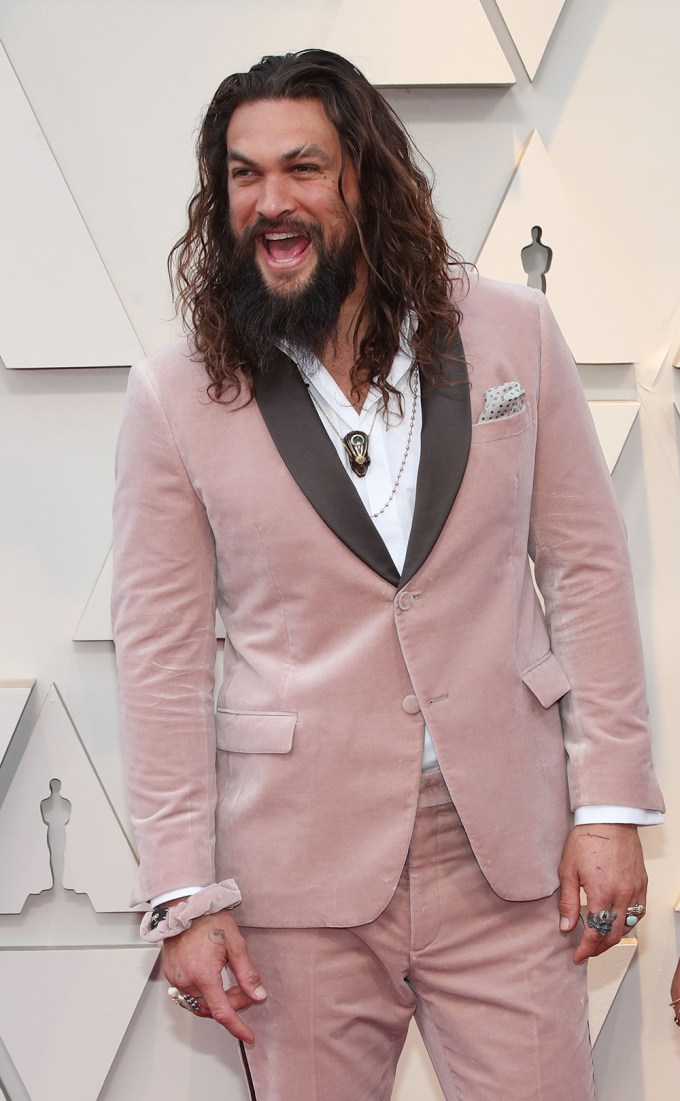 Jason Momoa in pink velvet at the 2019 Annual Academy Awards