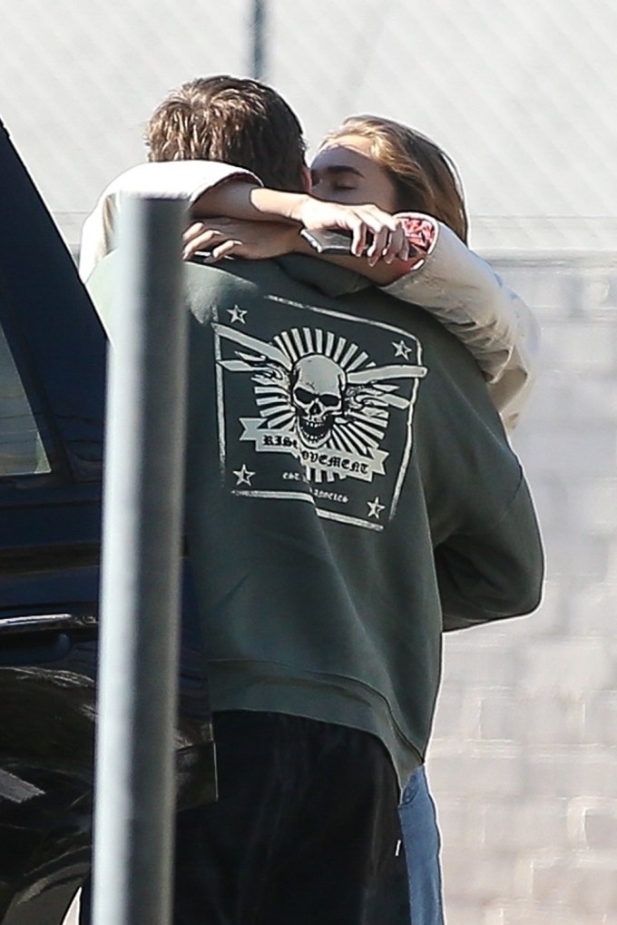 Liam Hemsworth & Gabriella Brooks hugging