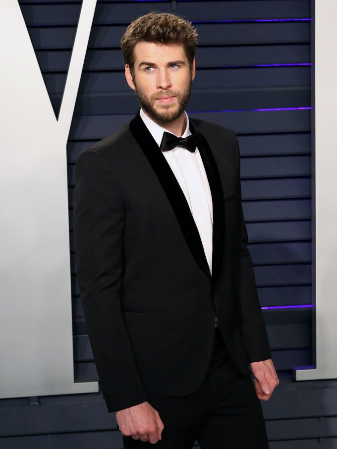 Liam Hemsworth rocks a suit at the 2019 Vanity Fair Oscar Party
