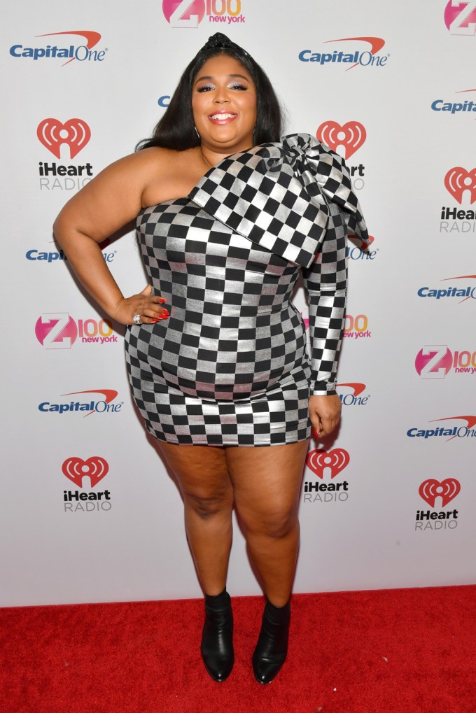Lizzo stuns in a fitted black-and-silver mini