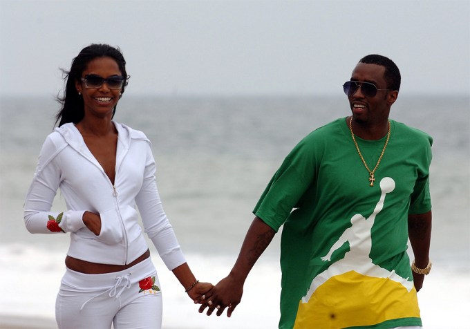 Kim Porter & Diddy Holding Hands