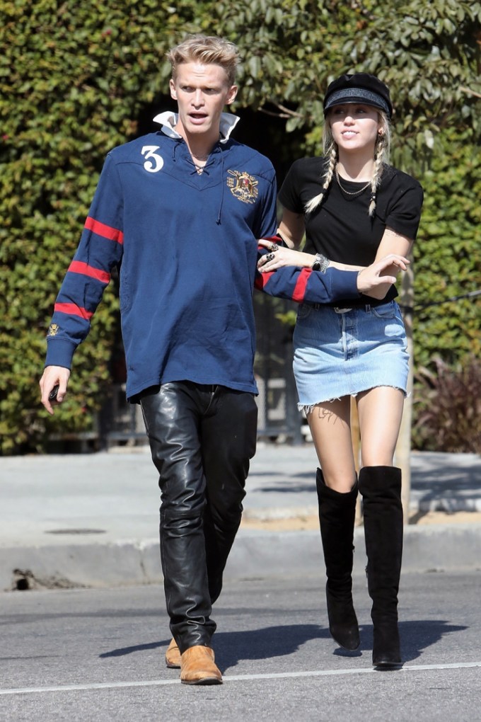 Miley Cyrus & Cody Simpson lock arms while heading to lunch in LA