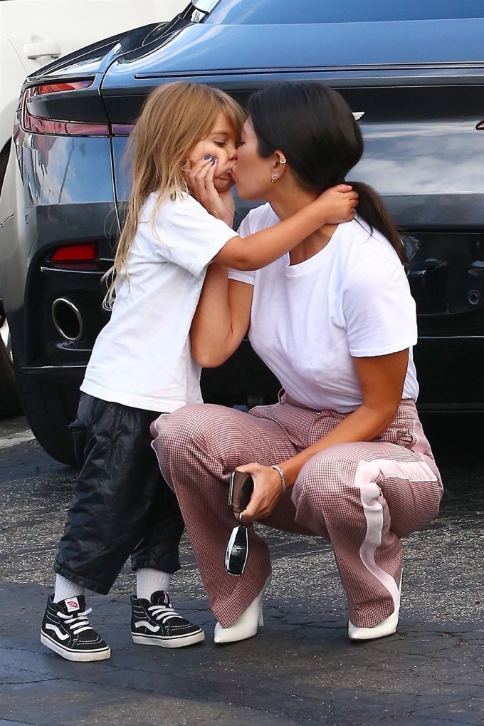 Kourtney Kardashian Kisses Reign Disick