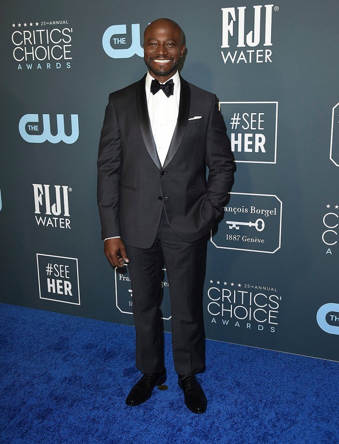 Host Taye Diggs is all-smiles on the blue carpet