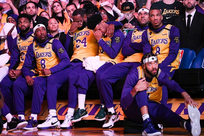 Lakers team members cry during Kobe tribute