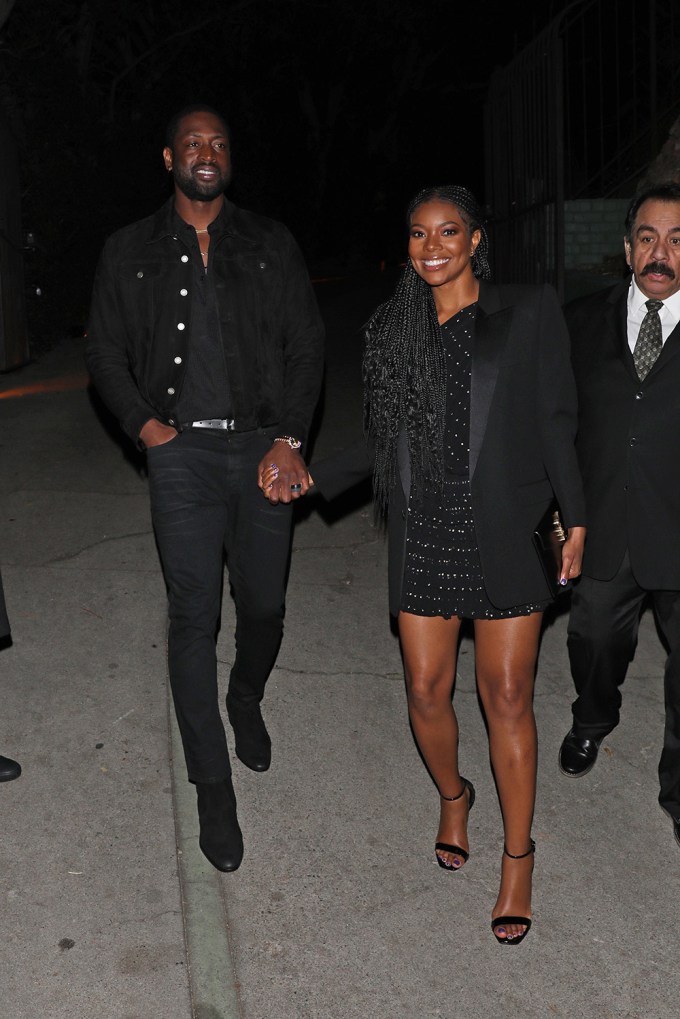 Dwyane Wade and Gabrielle Union are all smiles as they leave a pre Golden Globes party