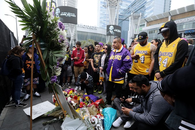 Fans pay tribute to Kobe Bryant with flowers at Staples Center
