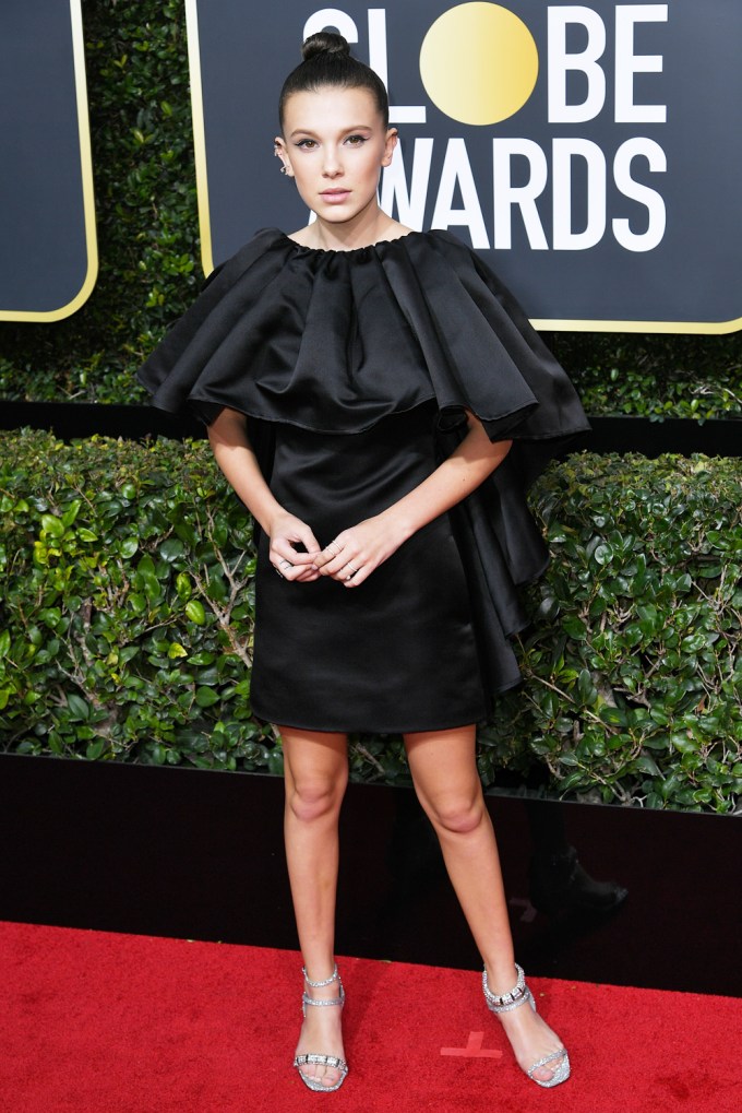 Millie Bobby Brown in a black mini dress at the 75th Annual Golden Globe Awards in 2018