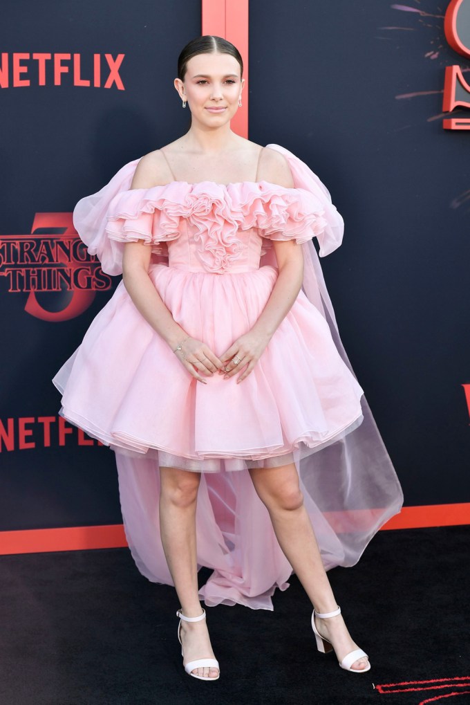 Millie Bobby Brown in a pink layered dress at an LA screening of ‘Stranger Things’ Season 3