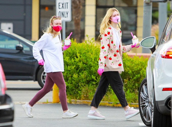 Dakota & Elle Fanning wearing face masks