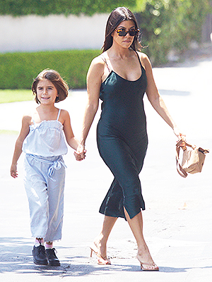 Kourtney Kardashian shows curves with daughter Penelope