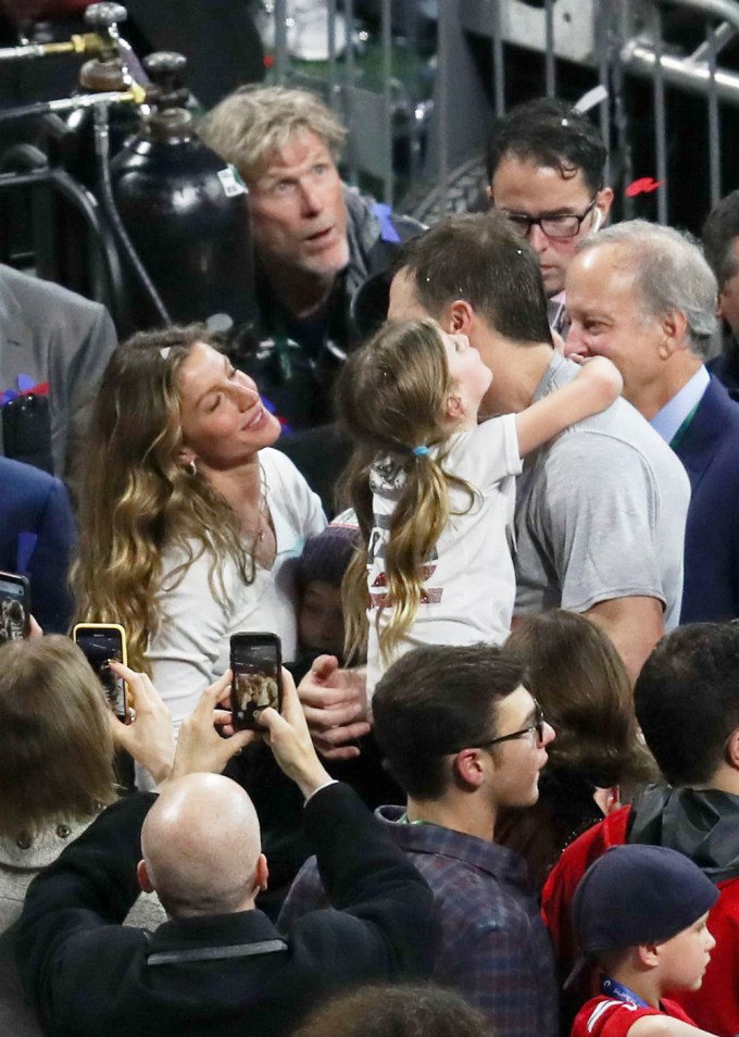 Tom Brady Holds Daughter Vivian After Winning