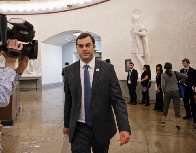 Justin Amash on his way to a House vote on defense spending.