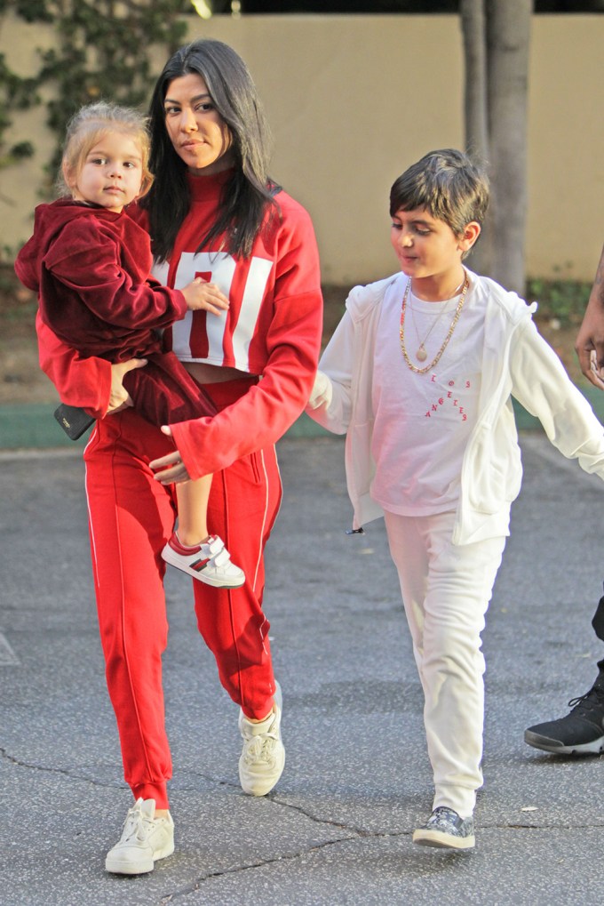 Kourtney Kardashian in a Red Sweatsuit