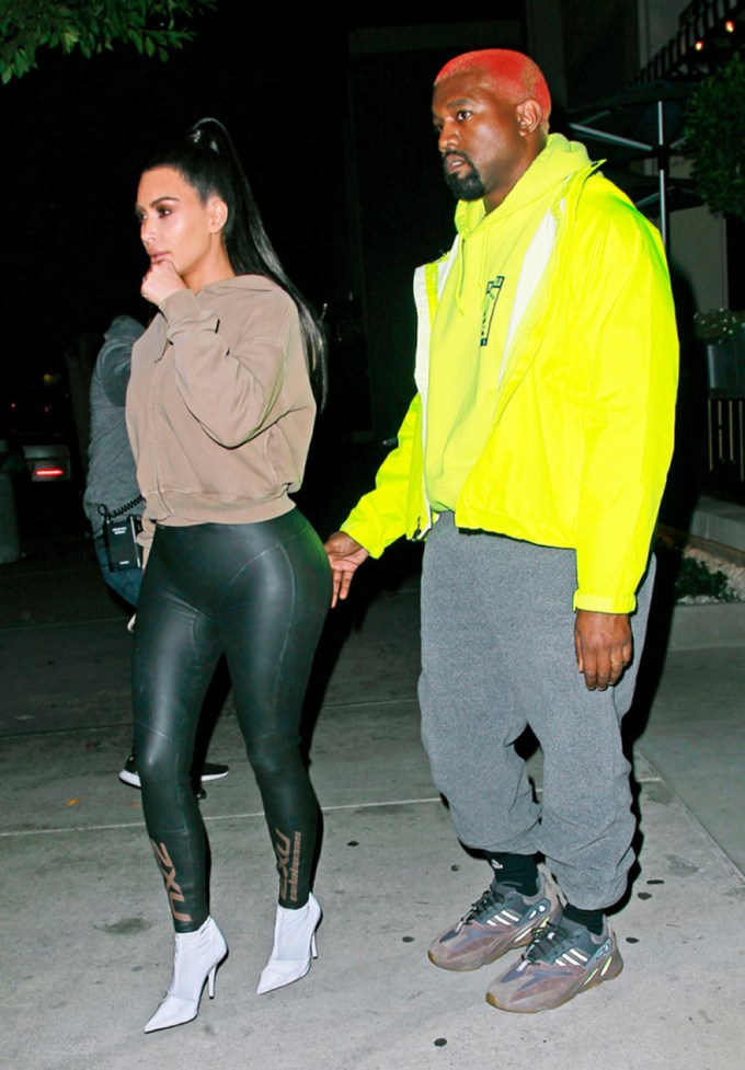 Kim Kardashian in Leather Leggings & a Sweatshirt