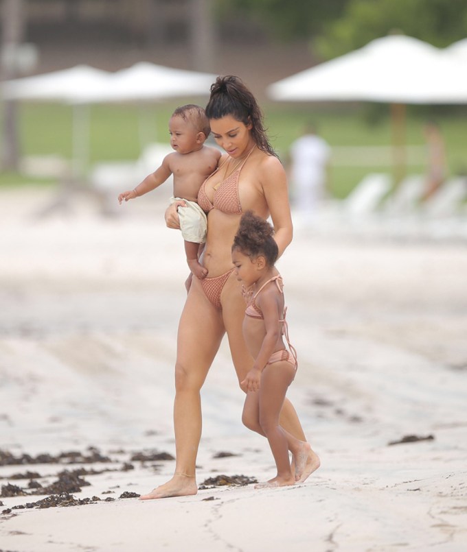 Kim Kardashian & her kids on a beach