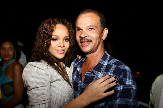 Rihanna and her dad Ronald Fenty at an album release