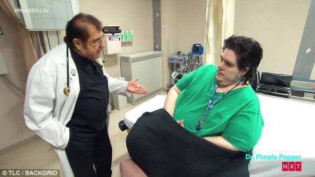 Dr Younan Nowzaradan speak with a patient post-exam