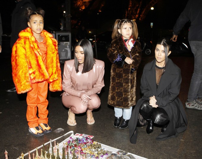 Kim Kardashian and Kourtney Kardashian with Penelope and North in Paris