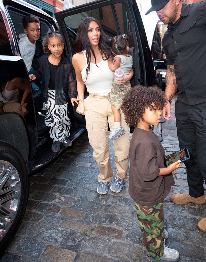 Kim Kardashian with North, Saint, Psalm, and Chicago West