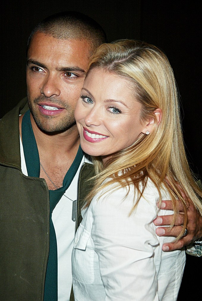 Kelly Rip and Mark Consuelos at the Spring 2004 Veteran by Danny Seo Fashion Show