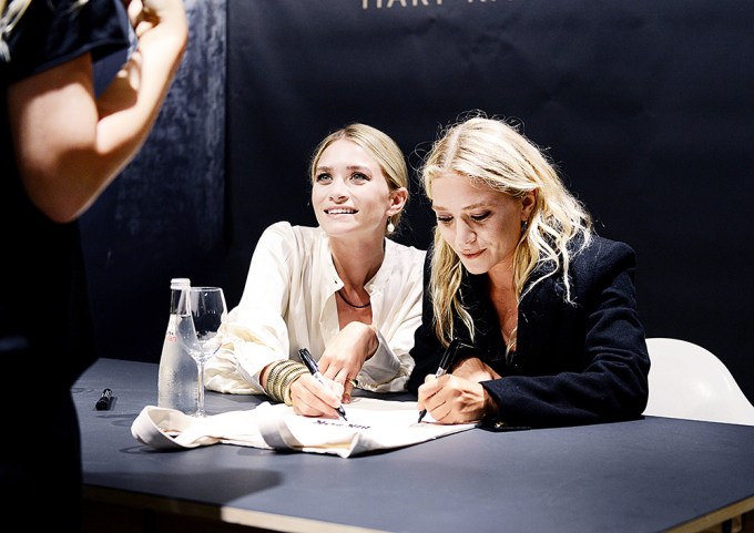 Mary-Kate and Ashley Olsen At A Signing