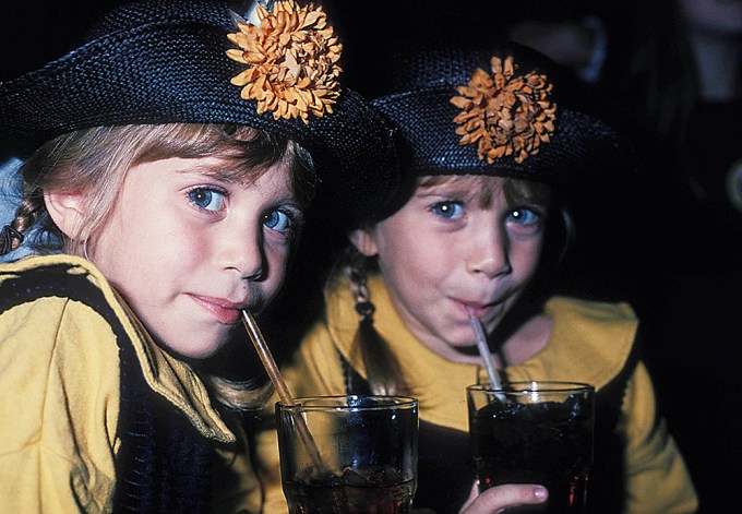 Mary-Kate Olsen and Ashley Olsen In Matching Hats