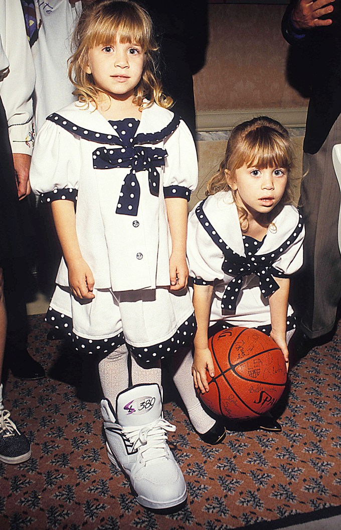 Mary-Kate and Ashley Olsen At A Basketball Event
