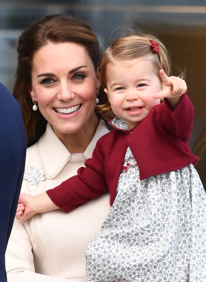 Princess Charlotte with her mom, Kate Middleton, during a Royal Tour