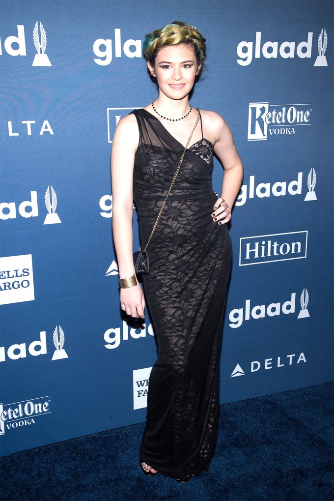Nicole Maines goes glam in a black lace gown
