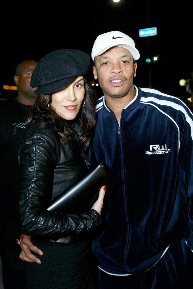 Dr. Dre and Nicole Young at a film premiere
