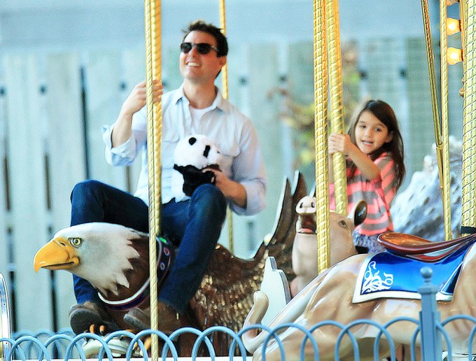 Tom Cruise, Katie Holmes, and Suri Cruise at schenley Plaza in Pittsburgh, PA
