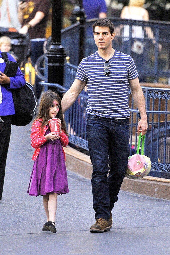 Tom Cruise and Suri spend the day at Disneyland in Anaheim