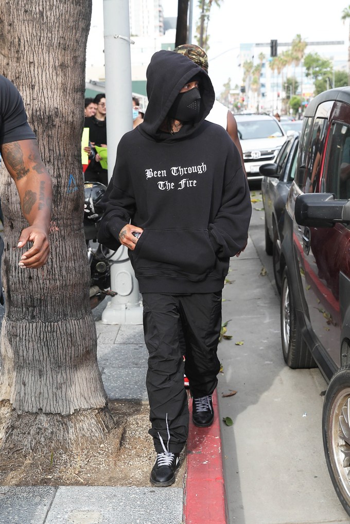 Tyga in a hoodie at a protest
