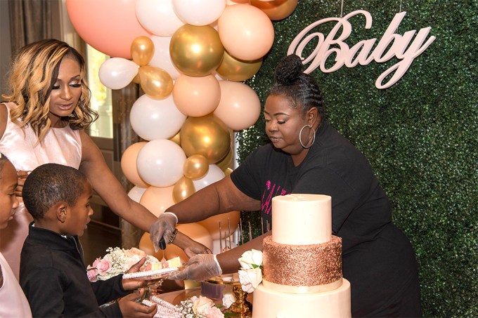 Melody Serves Cake At Her Baby Shower