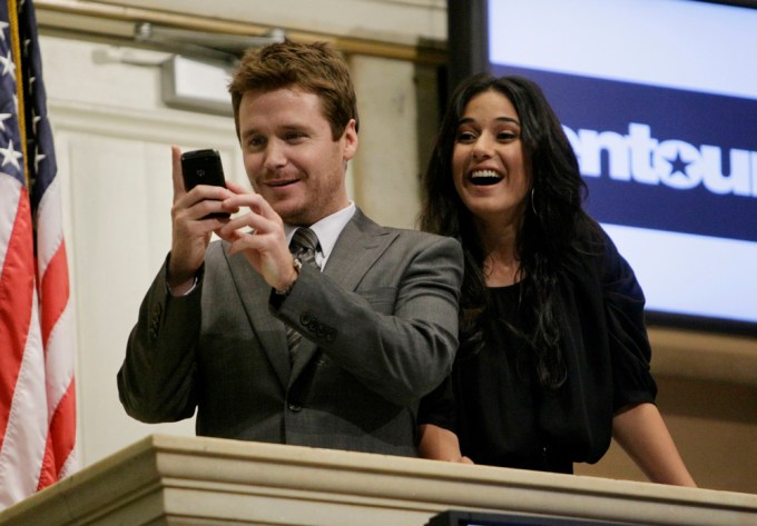 Kevin Connolly snaps a photo with Emmanuelle Chriqui