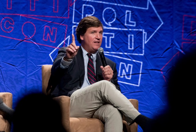 Tucker Carlson speaks to the audience at Politicon.