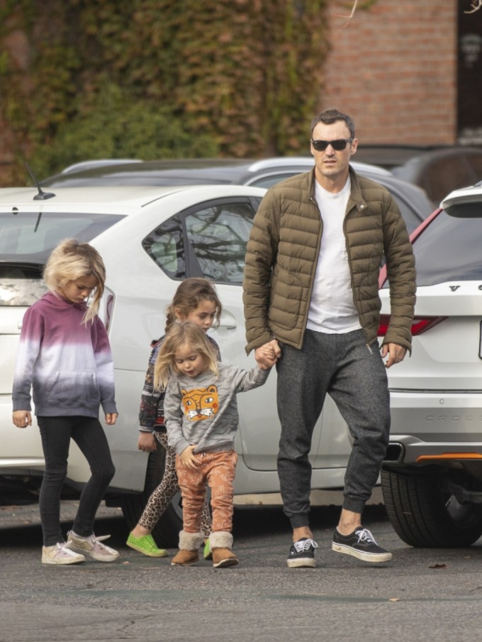 Brian Austin Green walking with his kids