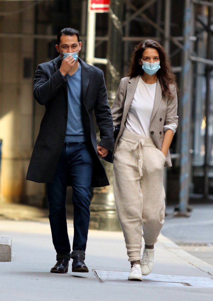 Katie Holmes and boyfriend Emilio Vitolo Jr. walk hand-in-hand