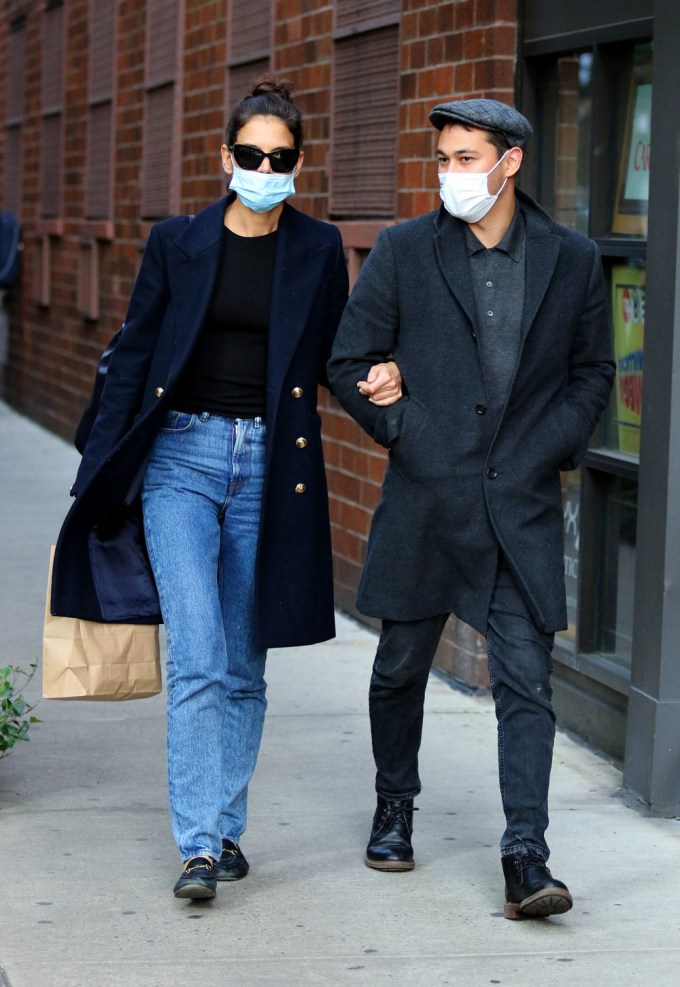 Katie Holmes and boyfriend Emilio Vitolo Jr. walk arm-in-arm in NYC
