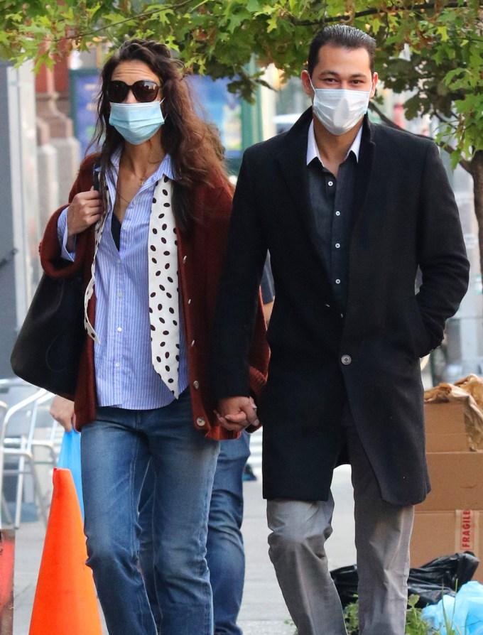 Katie Holmes and Emilio Vitolo Jr. walk hand-in-hand to his restaurant.