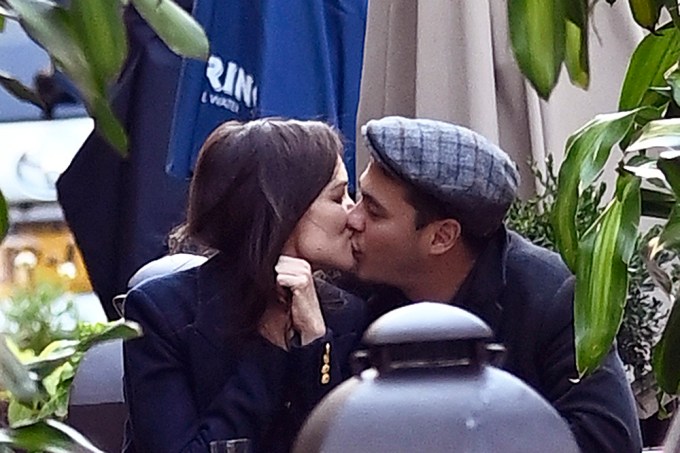 Katie Holmes and boyfriend Emilio Vitolo Jr. enjoy a steamy kiss.