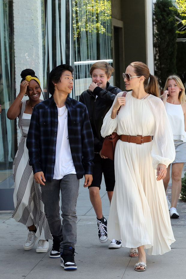 Jolie on X: 🆕Angelina Jolie at the Louis Vuitton store with Pax