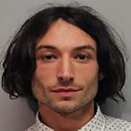 EXCLUSIVE: "The Flash" Movie Actor Ezra Miller was arrested and charged Sunday, March 27th, by Hawaii County Police with disorderly conduct and harassment at a small bar on the Big Island of Hawaii. According to Hawaii Police, the 29-year-old actor allegedly yelled when people started singing Karaoke at The Margarita Village Bar. He grabbed the microphone away from a woman and later lunged at a man playing darts. Both actions led to disorderly conduct and harassment offenses. Hawaii Police released Miller after posting a $500.00 bail. 28 Mar 2022 Pictured: The Flash" Movie Actor Ezra Miller arrested in Hawaii. Photo credit: Tim Wright / MEGA TheMegaAgency.com +1 888 505 6342 (Mega Agency TagID: MEGA842816_002.jpg) [Photo via Mega Agency]