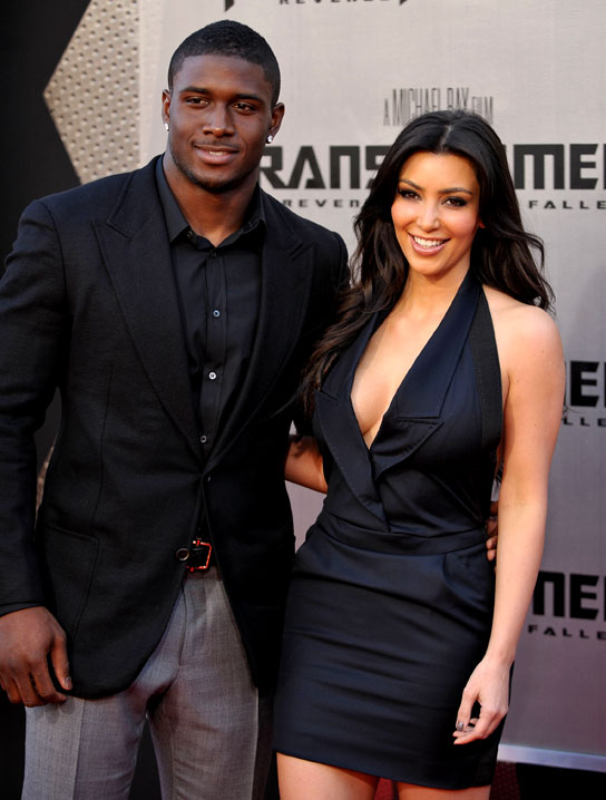 kim kardashian look alike reggie bush